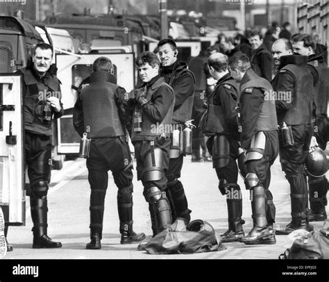 Strangeways Prison Riot 1st April 1990. Police Officers wait while in ...