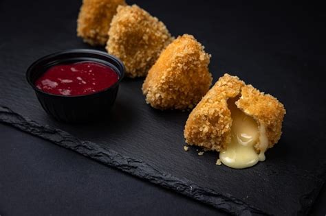 Premium Photo | Fried Mac and Cheese Bites with Dipping Sauce