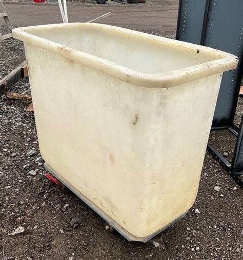 Plastic bin on wheels, used for hauling food to animals, 30 1/2"W x 15 ...