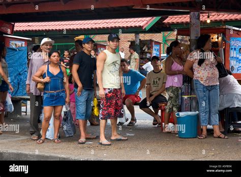 People wait at a bus stop in Manaus Brazil Stock Photo: 11296494 - Alamy