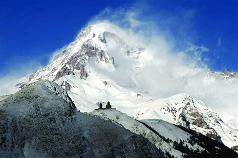 Skiing from the top of Mount Kazbegi - Colour Tour Georgia