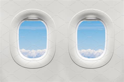 Isolated airplane window containing air, aircraft, and airline ...