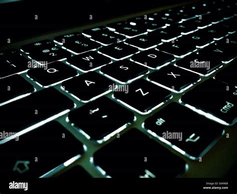 Apple backlit keyboard Stock Photo - Alamy