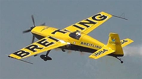 BREITLING Extra 300 Aerobatic Airshow! Loops, rolls, spins, low passes ...