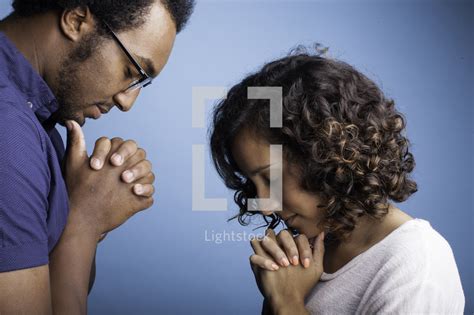 A couple praying — Photo — Lightstock