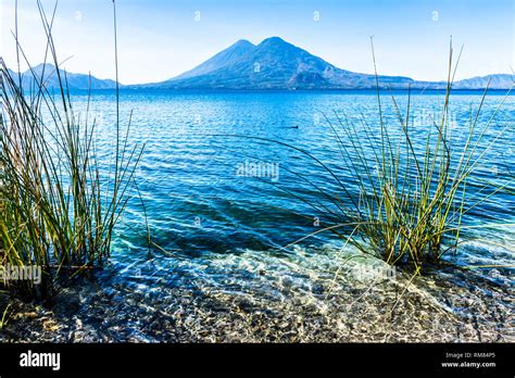 Atitlan & Toliman volcanoes on Lake Atitlan in Guatemalan highlands ...