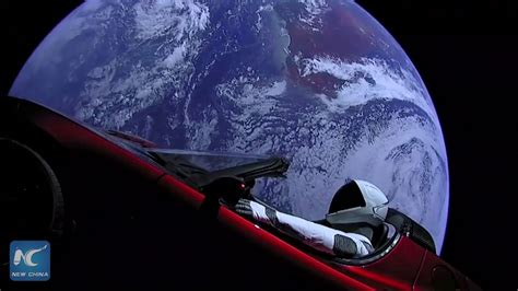 SpaceX streams video of Tesla Roadster floating through space - YouTube