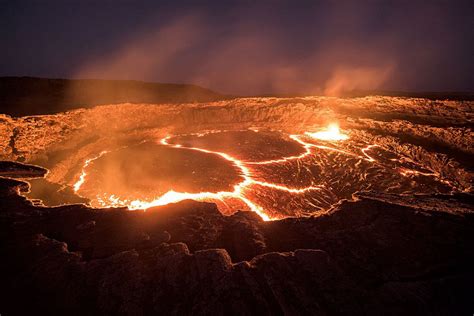 Incredible images of the “Gateway to Hell” – a rare lava lake | OverSixty