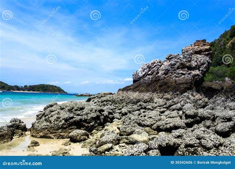 Rock and sand beach stock photo. Image of blue, nature - 30342606