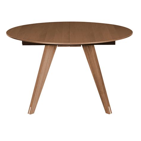 The Mood round dining table, walnut by Bolia boasts a top finish in walnut, with a frame finish ...