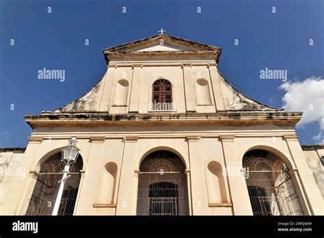 Old church facade under a blue sky, sign of age and history, Trinidad, Cuba, Central America ...