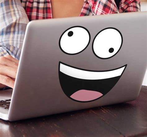 Sticker laptop gekke smiley - TenStickers