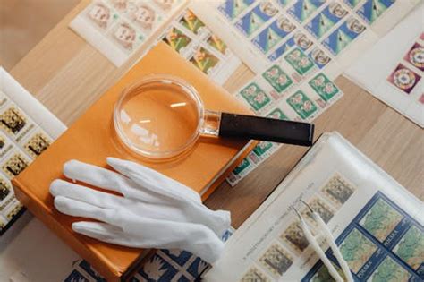 A Magnifying Glass on Postage Stamps · Free Stock Photo