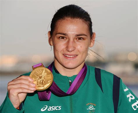 Katie Taylor says a pro world title win would rank alongside her Olympic gold medal | The Irish Sun