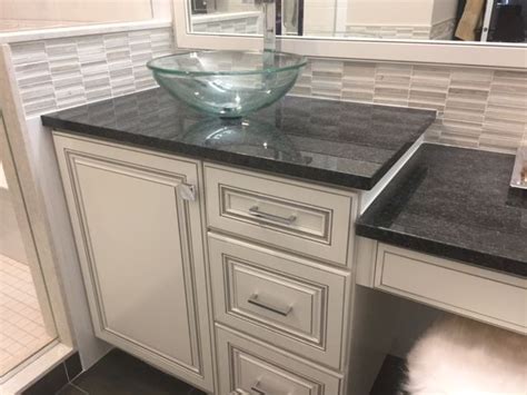 We installed this sleek Black Pearl granite countertop, Polished with mosaics … | Granite ...