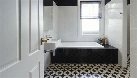 Bathrooms with Black and White Patterned Floor Tiles