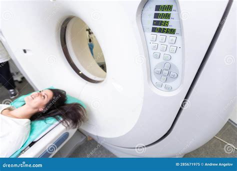 CT Scan Technologist Overlooking Patient in Computed Tomography Scanner ...