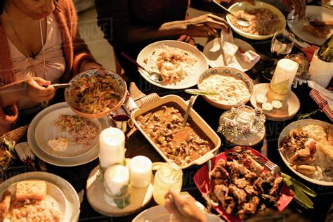 Caribbean food on Christmas dinner table - Stock Photo - Dissolve