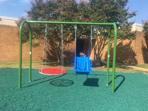 Project complete: Boy Scout, volunteers build adaptive swing set for special needs classmates ...