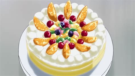 there is a cake with fruit on it