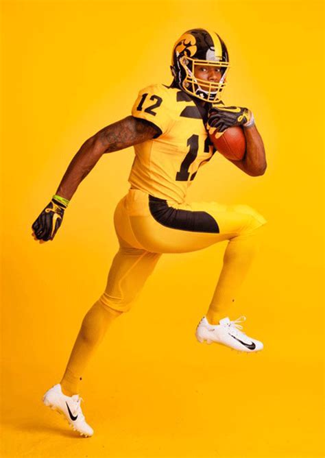 Iowa Hawkeyes Unveil Bold Gold Alternate Football Uniform – SportsLogos ...