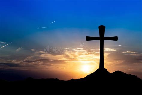 Cross on a hill at sunset stock image. Image of faith - 123540351