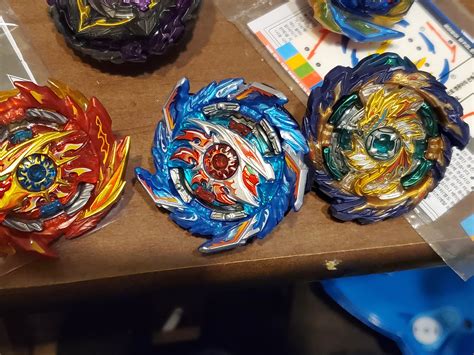 helios has stickers on now : r/Beyblade