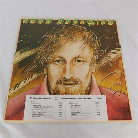an album cover with a drawing of a man's face and name on it