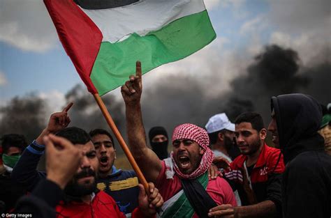 Palestinians prepare for protests as funerals begin for 16 people | Daily Mail Online