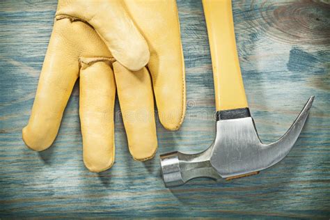 Horizontal Version of Claw Hammer Leather Safety Glove on Wooden Stock Image - Image of ...