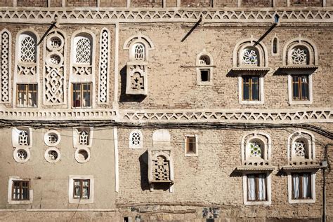 Traditional Yemeni heritage architecture design details in historic Sanaa old town buildings in ...