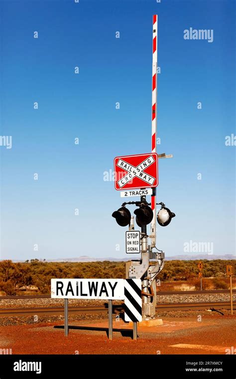 Iron ore train level crossing signal gate, Pilbara, Western Australia ...