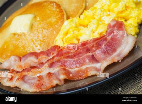 Eggs and Bacon, Scrambled Eggs and Pancakes, Pancake Breakfast Stock Photo: 72703724 - Alamy