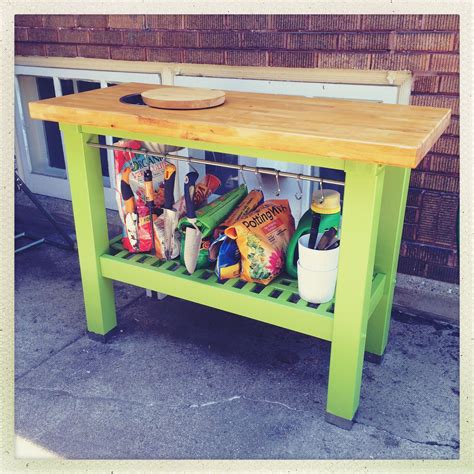 Ikea hack: potting bench from Ikea Groland kitchen island. Exterior paint on base. Exterior wood ...