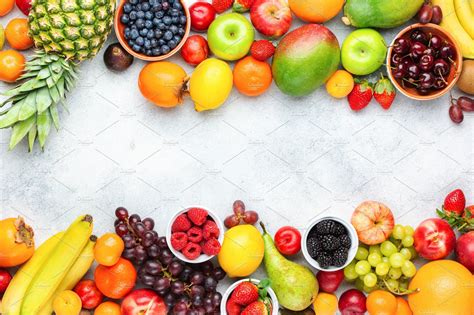 Rainbow fruits background featuring top view, white, and view, a Food ...