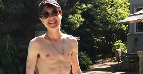 Elliot Page shares shirtless photo: 'Trans is beautiful'