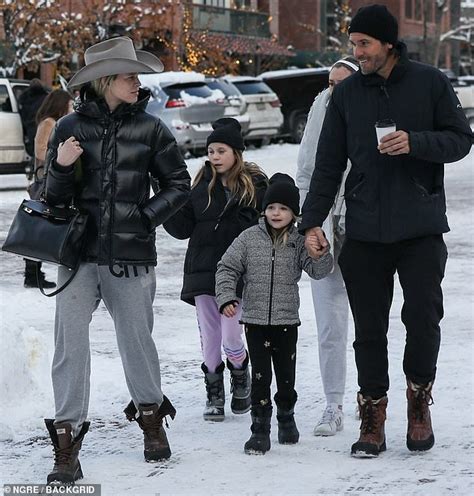 Sara Foster adds a touch of western to her winter look as she steps out with family in Aspen ...