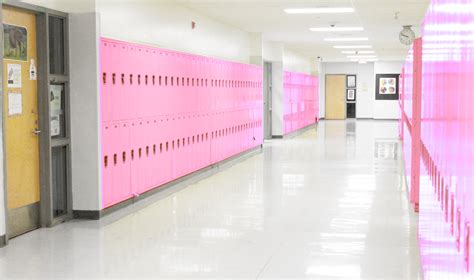 INT. SCHOOL LOCKERS PINK – DAY – Episode Life