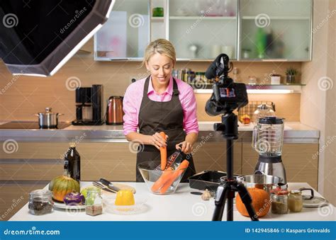 Woman Filming Cooking Vlog. Concept of Vlogging, Blogging and Content Creation Stock Photo ...