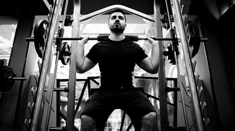 Smith Machine Squats: Benefits and Perfect Form - Fitnessbookz