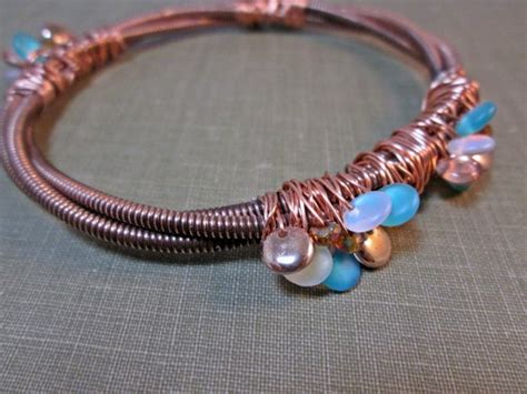 Items similar to Salvaged Piano Wire Jewelry // Copper Wire Wrapped ...