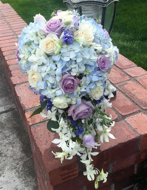 blue hydrangea and white roses cascading bouquet | Blue wedding bouquet, Blue hydrangea bridal ...