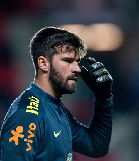 Alisson Becker of Brazil reacts prior the international friendly... | Brazil football team ...