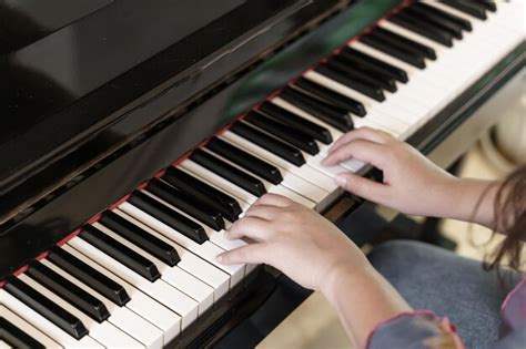 Premium Photo | Girl learn to play piano woman hand playing piano