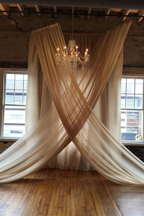 backdrop with hung voile in champagne | Wedding ceremony backdrop, Indoor wedding ceremonies ...