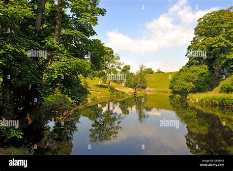 Reflections in river above burnsall hi-res stock photography and images - Alamy