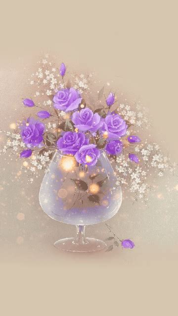 a vase filled with purple flowers on top of a table