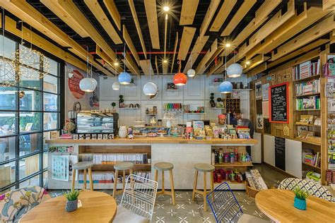 9 3/4 BOOKSTORE CAFÉ / Diseño Interior on Behance | Bookstore cafe ...