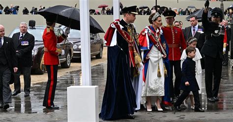 Kate Middleton forced to hitch up Coronation dress due to rain as she ...