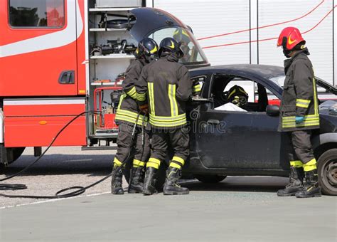 Firefighters in Action during the Road Accident Stock Photo - Image of department, firehouse ...